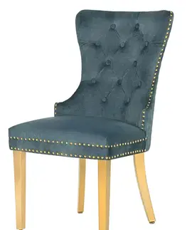 Estila Glamour čalouněná prošívaná sametově modrá jídelní židle Modern Barock se zlatými kovovými nožičkami a klepátkem 98 cm