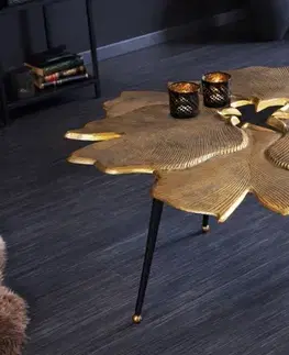 Estila Art deco konferenční stolek Ginko zlaté barvy ve tvaru listů s černými nožičkami z kovu 90cm