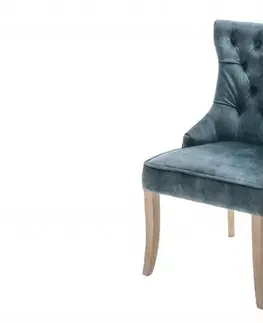 Estila Stylová jídelní židle Torino s tmavomodrým sametovým potahem s chesterfield prošíváním a stříbrným klepadlem 96cm
