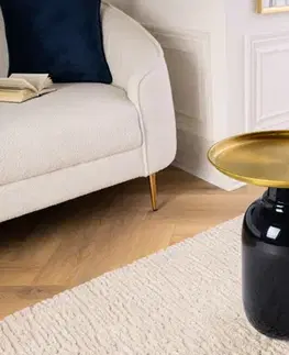 Estila Designový art deco kulatý příruční stolek Belletza s mohutnou lesklou černou nohou a zlatou vrchní deskou 50 cm