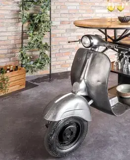 Estila Industriální barový stůl Scooter s designem motorky a policemi a vrchní deskou z mangového dřeva stříbrná 116 cm