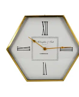 Estila Stylové šestiúhelníkové art deco nástěnné hodiny Hex se zlatým rámem s glamour nádechem 53 cm