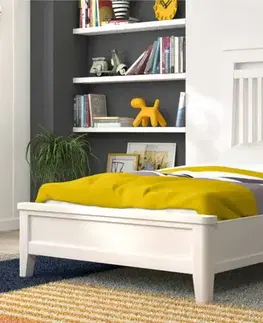 Estila Moderní designová postel Lyon z masivního dřeva s vysokým žebrovaným čelem 104cm