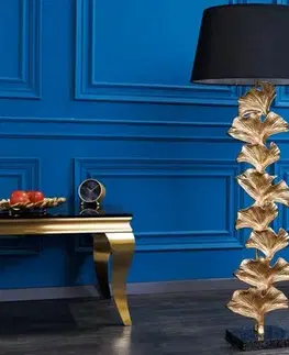 Estila Art deco stojací lampa Ginka z kovu ve zlaté barvě s černým textilním stínítkem 122cm