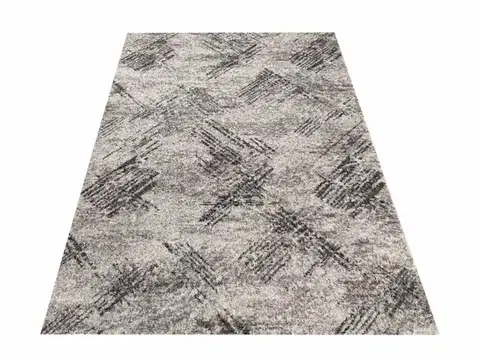 Moderní béžový koberec s jemným vzorem Šířka: 80 cm | Délka: 150 cm