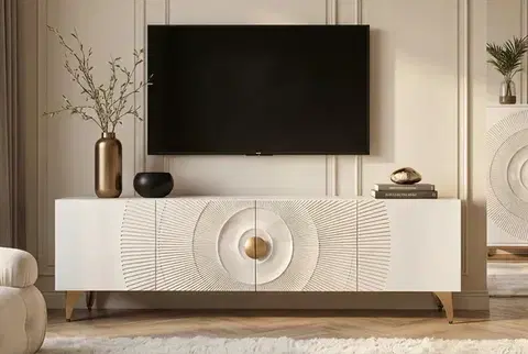 Estila Designový etno bílý TV stolek Cumbria se čtyřmi dvířky se zlatými detaily a reliéfem s motivem paprsků 180 cm